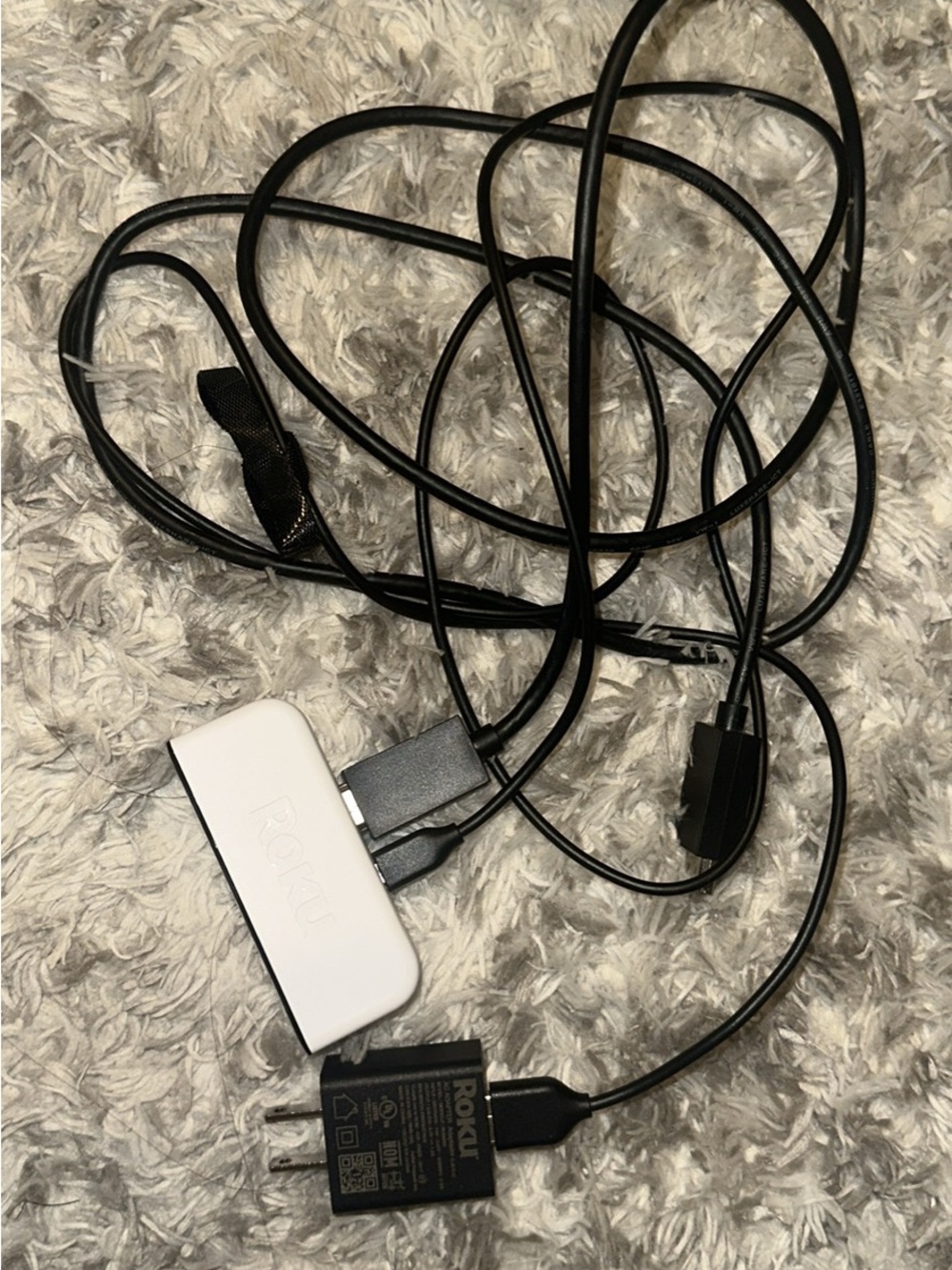 Roku White Streaming Stick with Black Cables and Power Adapter